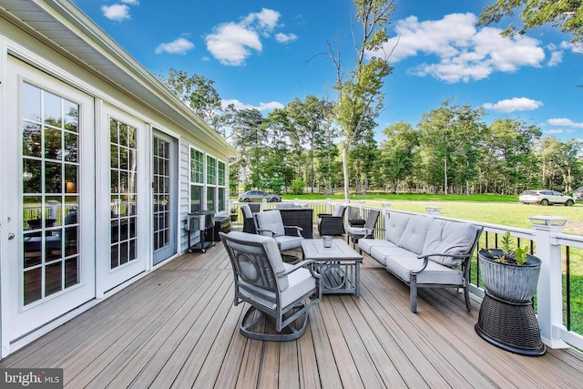 13001 Wipple Ct, Fredericksburg, VA 22407 - wooden deck with outdoor lounge area, a lawn, and view of scattered trees