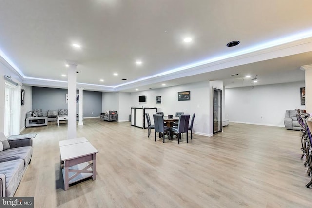 13001 Wipple Ct, Fredericksburg, VA 22407 - living area with light wood-style floors, recessed lighting, and a tray ceiling
