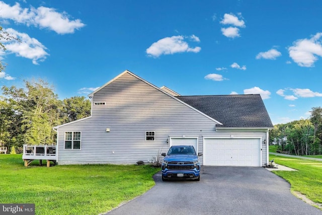 13001 Wipple Ct, Fredericksburg, VA 22407 - view of side of home with driveway, a lawn, an attached garage, roof with shingles, and a wooden deck