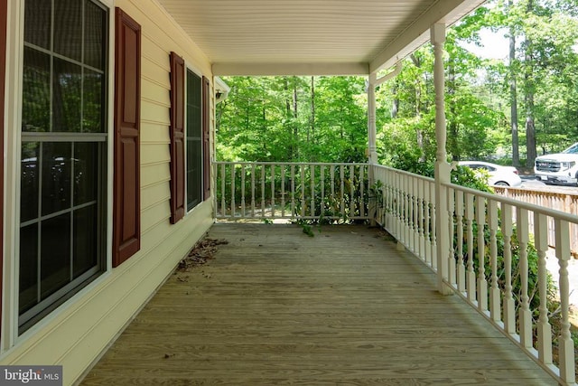 wooden deck featuring a porch