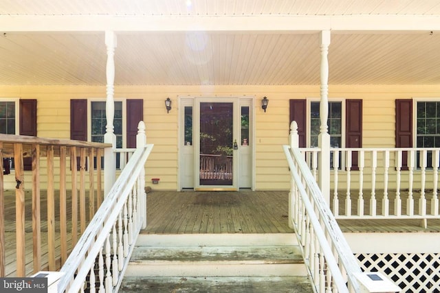 entrance to property with a porch