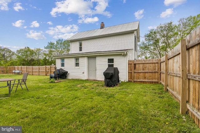 12051 Duey Rd N, Remington, VA 22734 - rear view of property with a fenced backyard, metal roof, a chimney, and a lawn