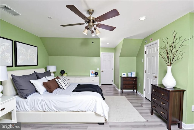 12107 Knight Ct, Fredericksburg, VA 22407 - bedroom with light wood-type flooring, recessed lighting, ceiling fan, baseboards, and lofted ceiling
