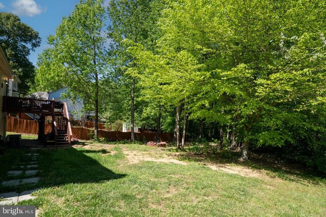 12107 Knight Ct, Fredericksburg, VA 22407 - view of yard with stairway, a wooden deck, and central air condition unit