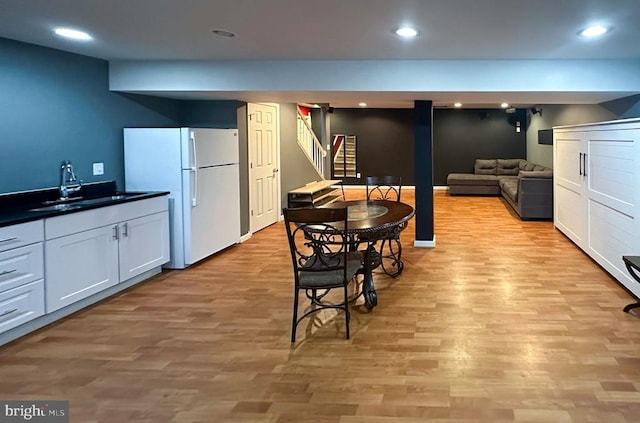12107 Knight Ct, Fredericksburg, VA 22407 - dining space featuring stairway, light wood-style floors, and recessed lighting