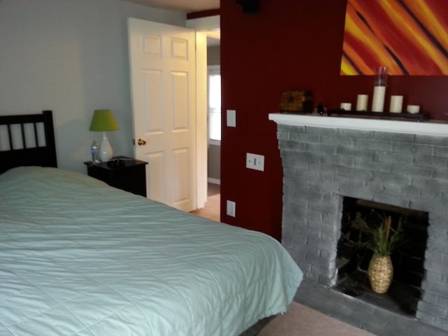 1111 Maple St, Staunton, VA 24401 - bedroom with carpet flooring and a fireplace