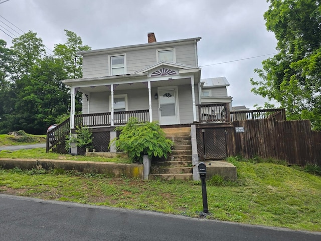 1111 Maple St, Staunton, VA 24401 - view of front of property with a porch, a chimney, and stairway