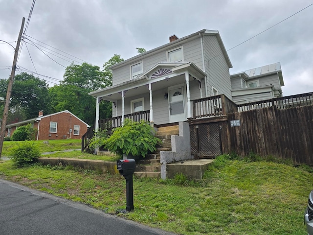 1111 Maple St, Staunton, VA 24401 - view of front facade featuring a porch and a chimney