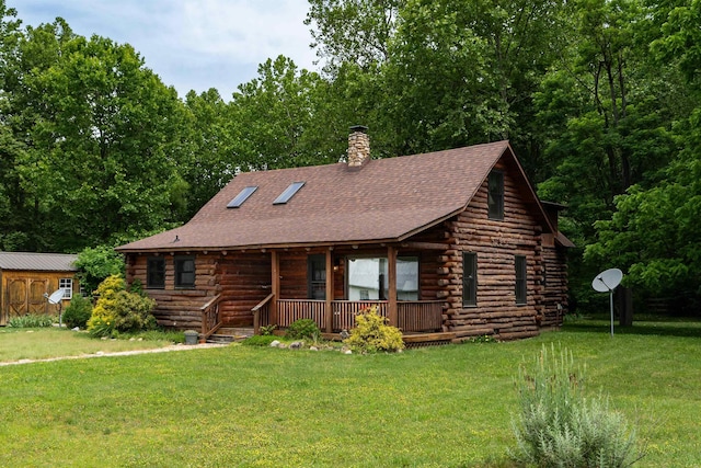 35 Bottom Rd S, Raphine, VA 24472 - log home with log siding, a porch, a front yard, and a shingled roof