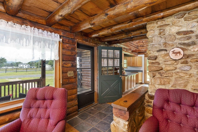 35 Bottom Rd S, Raphine, VA 24472 - living area featuring a wooden ceiling with exposed beams, rustic walls, and dark tile patterned floors