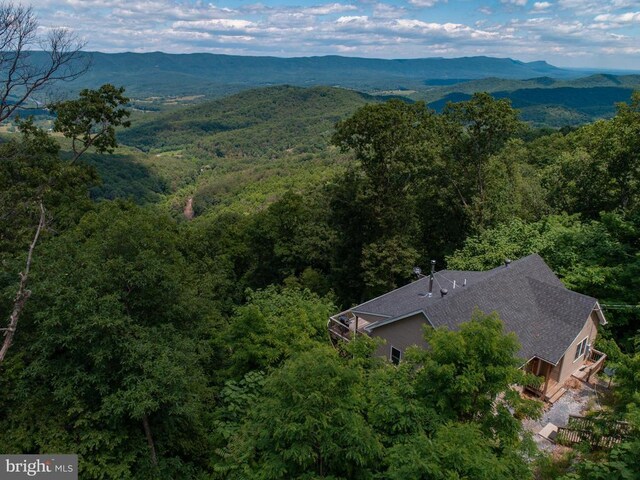 1076 Overlook Dr, Rileyville, VA 22650 - view from above of property with a heavily wooded area and mountains
