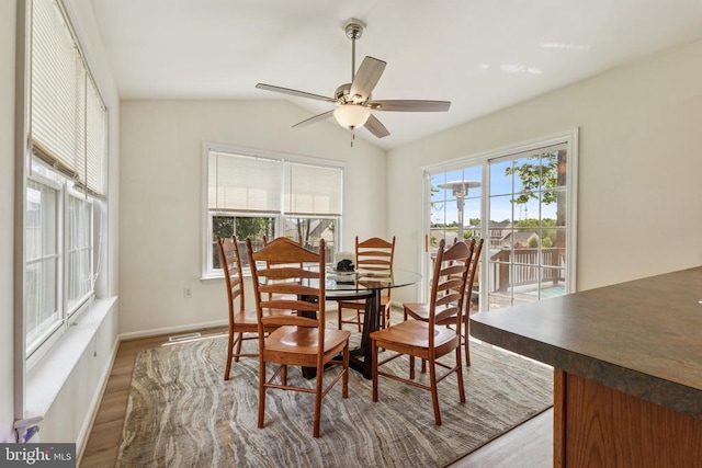 12224 Stonehenge Dr, Fredericksburg, VA 22407 - dining space featuring wood finished floors, ceiling fan, lofted ceiling, and baseboards