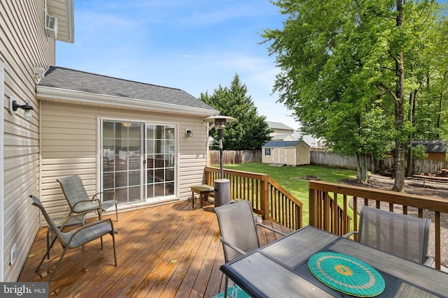 12224 Stonehenge Dr, Fredericksburg, VA 22407 - wooden terrace featuring a shed, an outdoor structure, and outdoor dining space