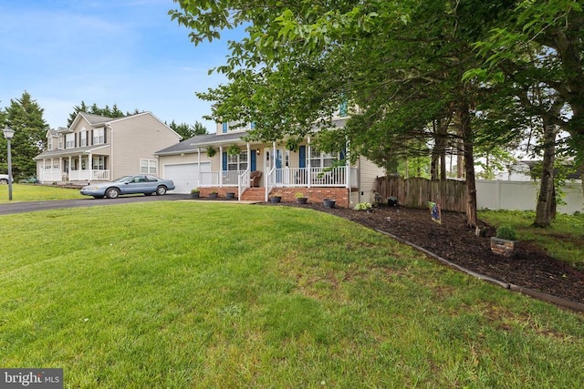 12224 Stonehenge Dr, Fredericksburg, VA 22407 - view of front facade featuring covered porch, asphalt driveway, and an attached garage
