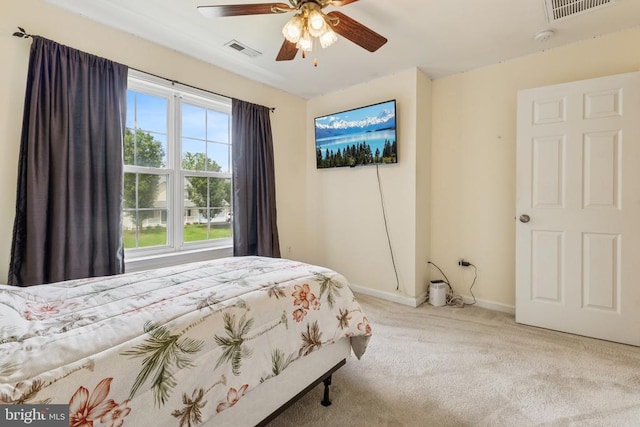 12224 Stonehenge Dr, Fredericksburg, VA 22407 - carpeted bedroom with baseboards and a ceiling fan