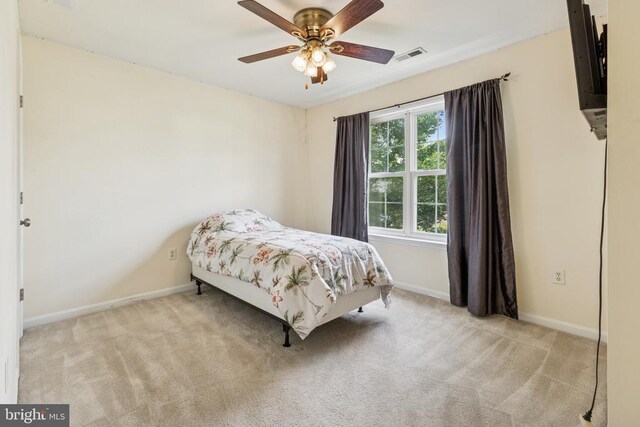 12224 Stonehenge Dr, Fredericksburg, VA 22407 - carpeted bedroom featuring baseboards and a ceiling fan