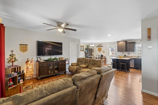 300 8th St, Grottoes, VA 24441 - living room with a ceiling fan, wood finished floors, and recessed lighting