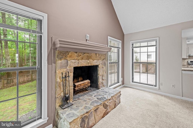 47 Marwood Dr, Palmyra, VA 22963 - living room with vaulted ceiling, a stone fireplace, and carpet floors