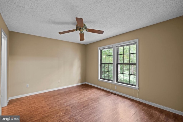 47 Marwood Dr, Palmyra, VA 22963 - unfurnished room with wood finished floors, ceiling fan, and a textured ceiling