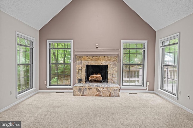 47 Marwood Dr, Palmyra, VA 22963 - unfurnished living room with high vaulted ceiling, carpet, a fireplace, and a textured ceiling