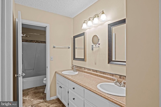 47 Marwood Dr, Palmyra, VA 22963 - bathroom with double vanity, a textured ceiling, and shower / tub combination
