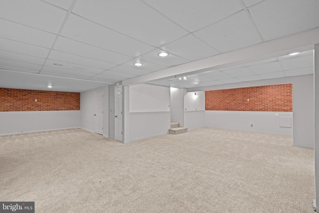 47 Marwood Dr, Palmyra, VA 22963 - finished basement with carpet flooring, a paneled ceiling, brick wall, stairway, and recessed lighting
