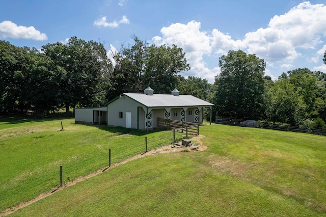 5090 Springhouse Cir, Rockingham, VA 22802 - view of yard with fence, an outbuilding, and an exterior structure