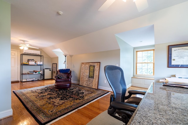 5090 Springhouse Cir, Rockingham, VA 22802 - home office featuring lofted ceiling, ceiling fan, an AC wall unit, baseboards, and light wood-style floors