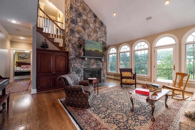 5090 Springhouse Cir, Rockingham, VA 22802 - living area featuring a fireplace, a wealth of natural light, baseboards, and dark wood-style floors