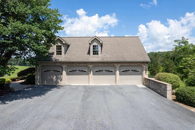 5090 Springhouse Cir, Rockingham, VA 22802 - garage with aphalt driveway
