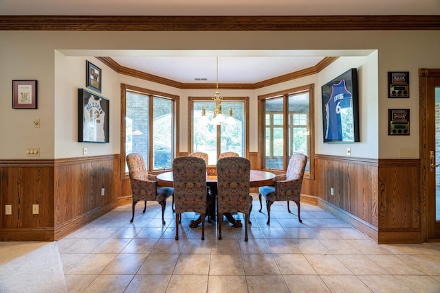 5090 Springhouse Cir, Rockingham, VA 22802 - dining room with wainscoting, a chandelier, and wood walls