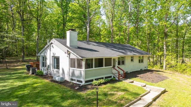 1905 Artillery Ridge Rd, Fredericksburg, VA 22408 - rear view of house featuring a chimney, roof with shingles, a lawn, and central AC