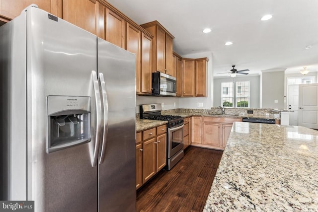 3107 Alliance Ct, Fredericksburg, VA 22408 - kitchen featuring appliances with stainless steel finishes, a sink, recessed lighting, a ceiling fan, and light stone countertops