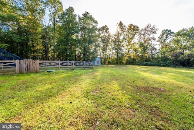  - view of yard featuring a storage shed