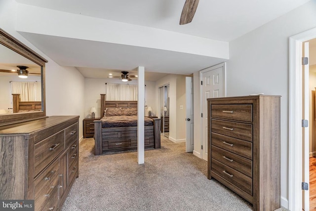  - bedroom featuring light colored carpet