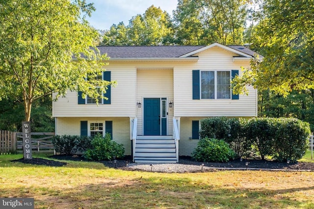  - bi-level home featuring brick siding