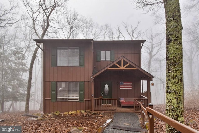 rustic home with covered porch