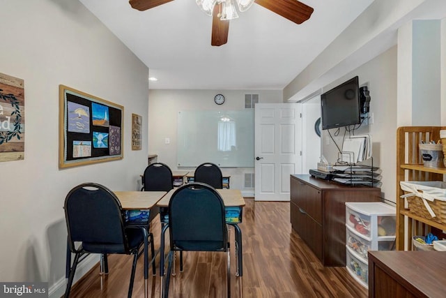  - office area featuring ceiling fan and dark wood-style floors