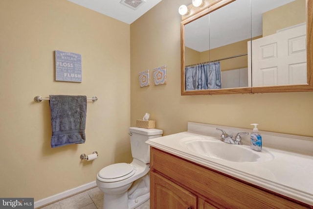 - full bathroom featuring tile patterned floors, vanity, toilet, and baseboards