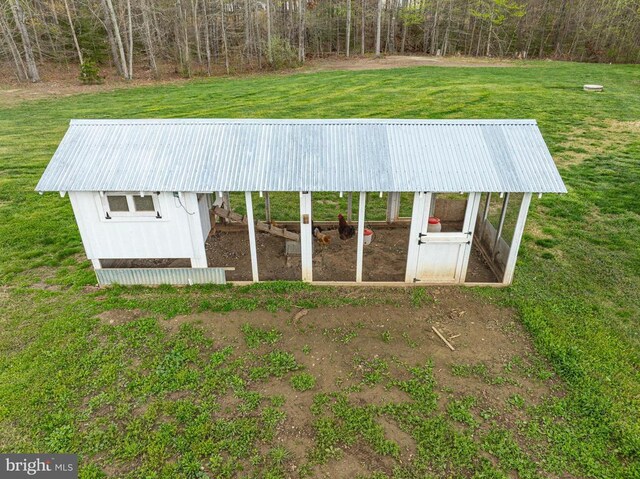  - view of poultry coop with a lawn