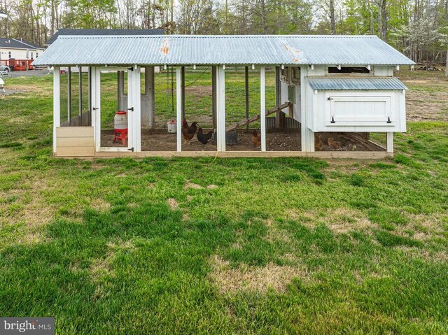  - view of poultry coop with a lawn
