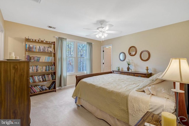  - carpeted bedroom with ceiling fan
