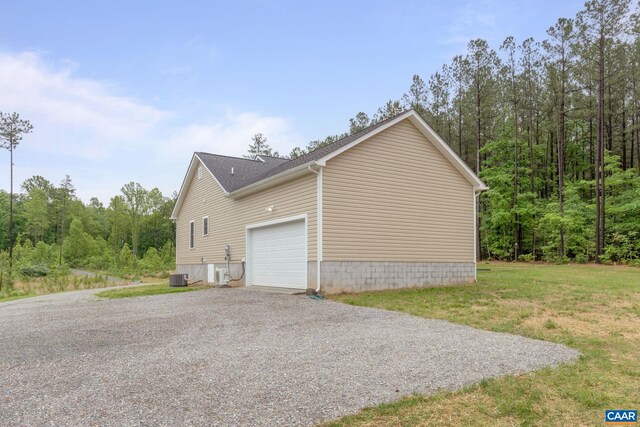 6169 Community House Rd, Columbia, VA 23038 - view of side of property with driveway, central AC, and an attached garage