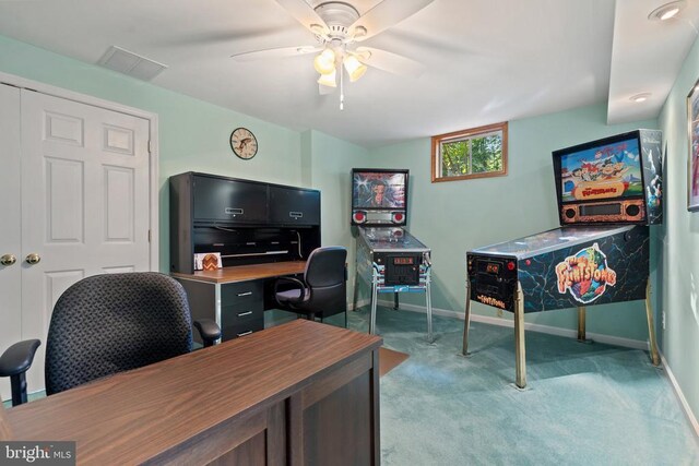  - office space with light carpet, baseboards, and ceiling fan