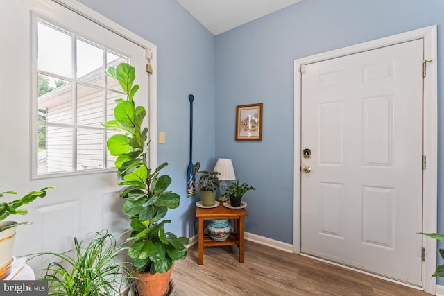 12219 Glade Dr, Fredericksburg, VA 22407 - entrance foyer with wood finished floors, healthy amount of natural light, and baseboards