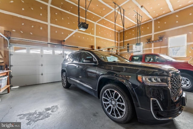 12219 Glade Dr, Fredericksburg, VA 22407 - garage featuring a garage door opener