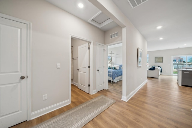 14767 Green View Dr, Elkton, VA 22827 - corridor featuring attic access, baseboards, visible vents, and light wood-style floors