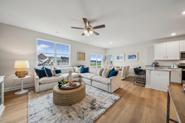 14767 Green View Dr, Elkton, VA 22827 - living room featuring baseboards, recessed lighting, light wood-type flooring, and a ceiling fan