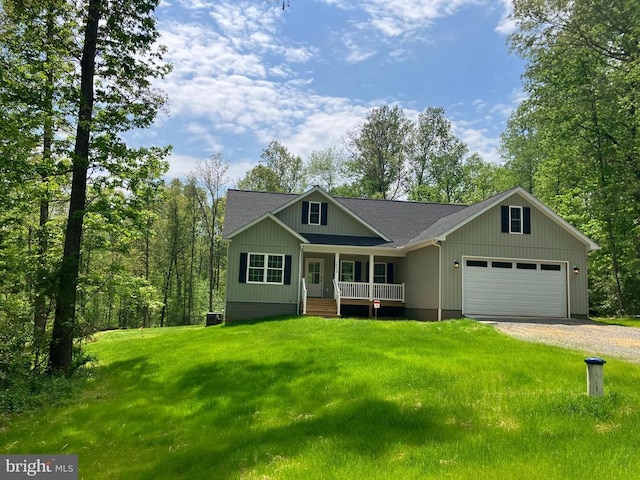 14400 Reva Rd, Reva, VA 22735 - view of front of home featuring a porch, a garage, driveway, and a front lawn