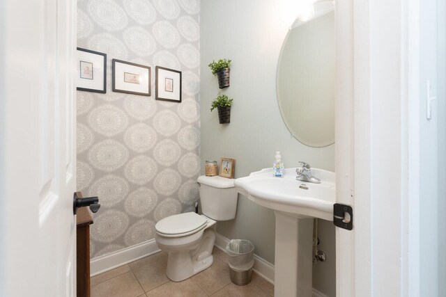 21 Spring View Dr, Staunton, VA 24401 - half bathroom featuring toilet, tile patterned flooring, baseboards, and a sink